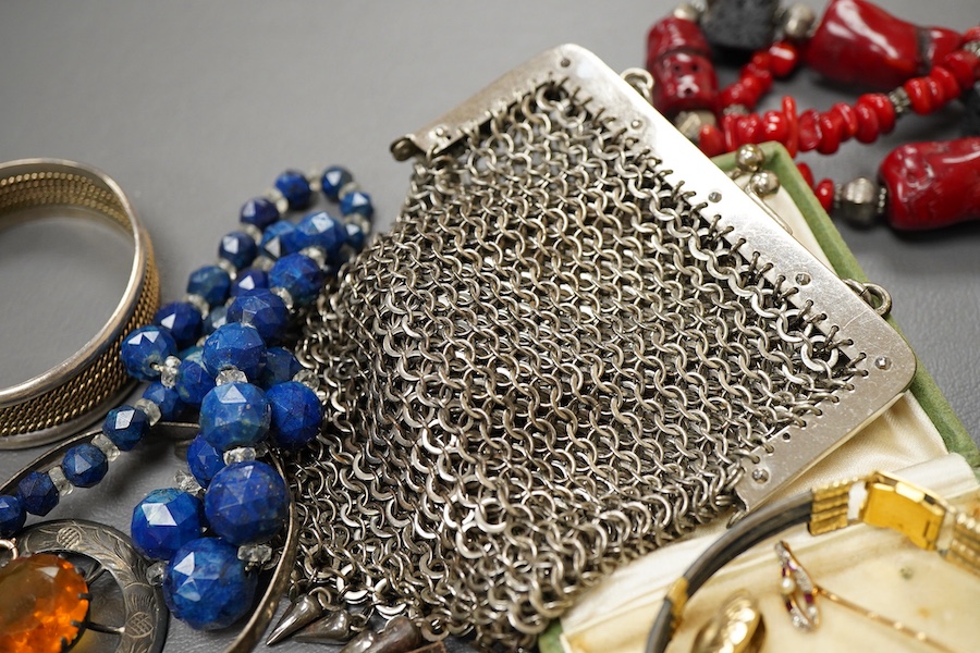 A collection of jewels, comprising: an early 20th century ruby, diamond and seed pearl stick pin, stamped 15ct, length 5.9cm, gross weight approximately 1.5 grams, one diamond deficient; together with a pair of ear clips